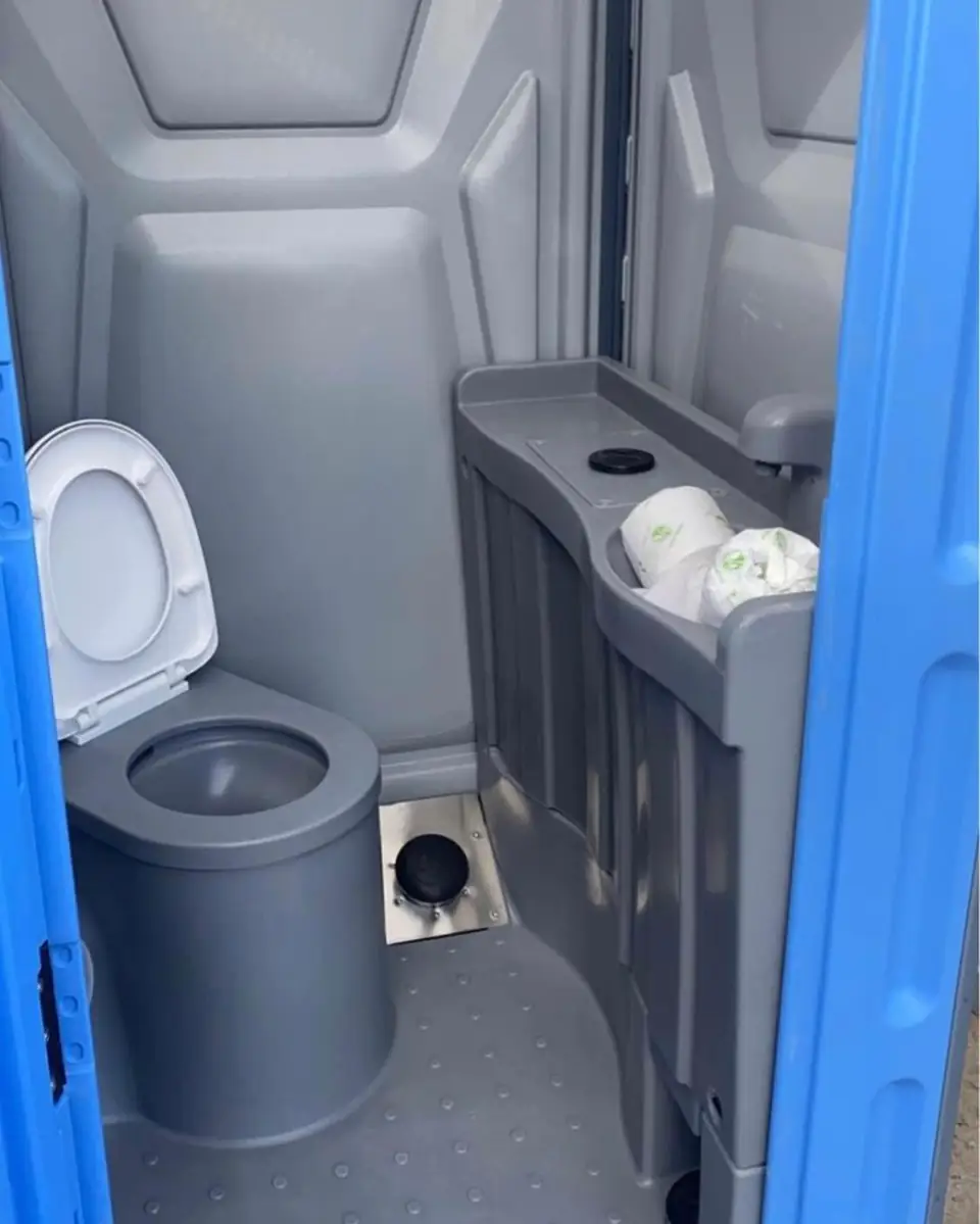 Unit with a toilet seat and a built-in hand-wash basin